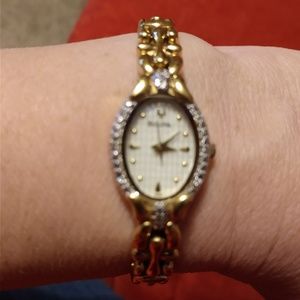 Woman's Bulova gold and diamond watch